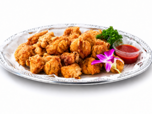 プランに含まれる唐揚げを盛り付けた大皿料理の画像